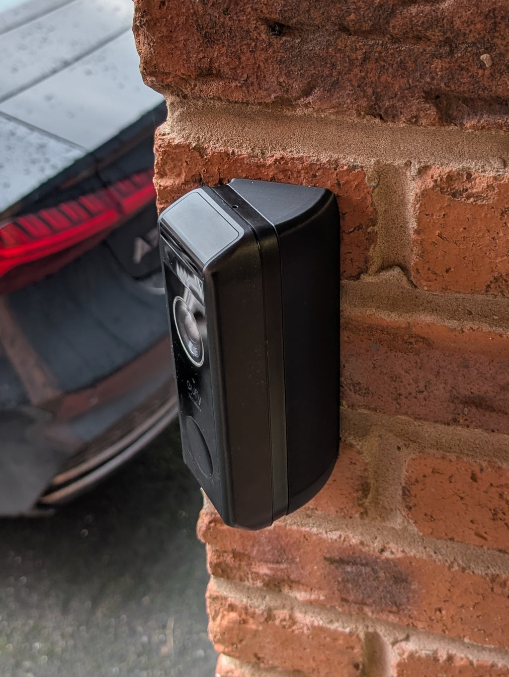 Eufy Video Doorbell Dual S330 Reversible Angle Mount, in black. Mounted on wall.