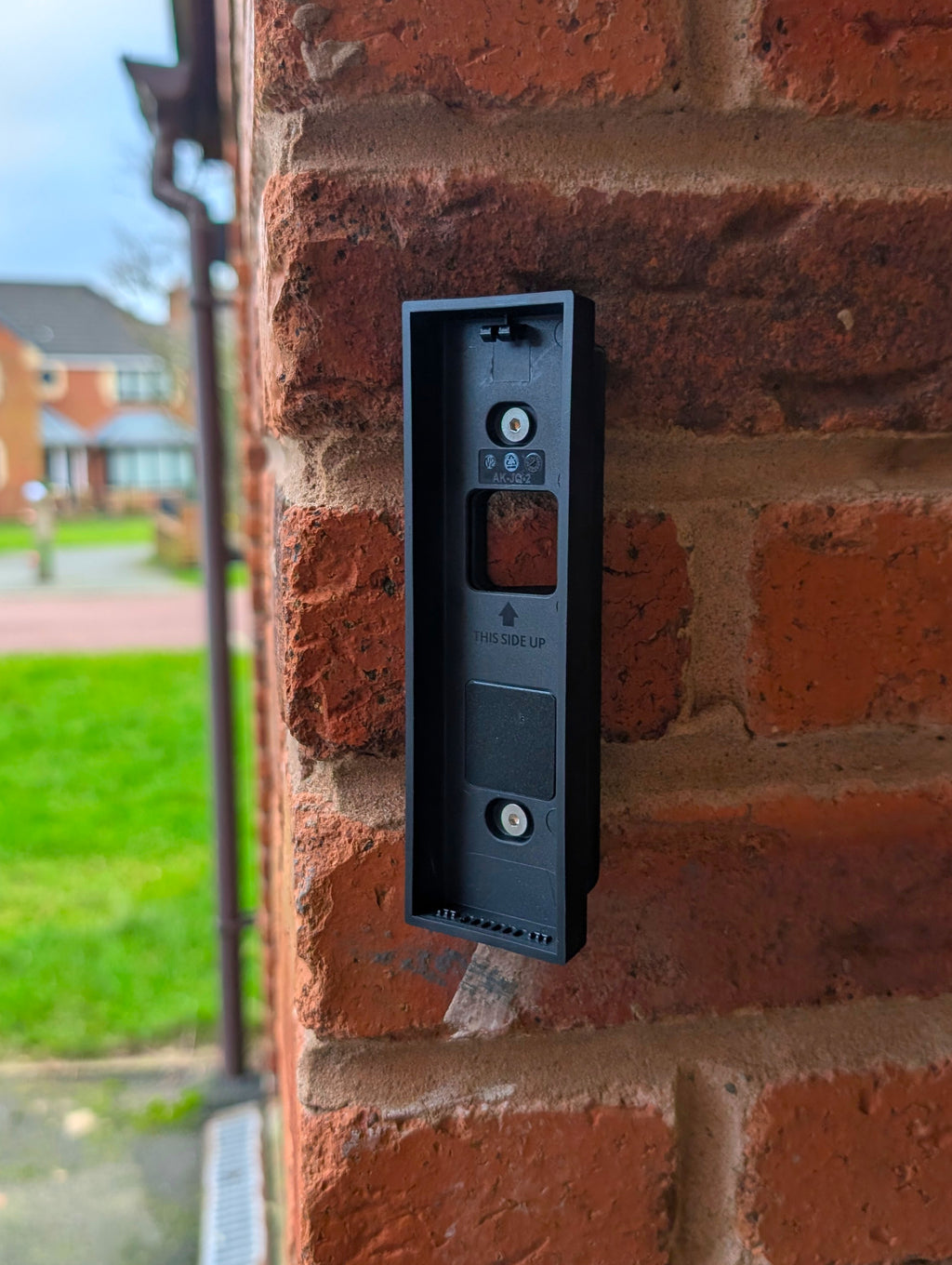 Eufy Video Doorbell E340 Reversible Angle Mount, in black. Mounted on wall.
