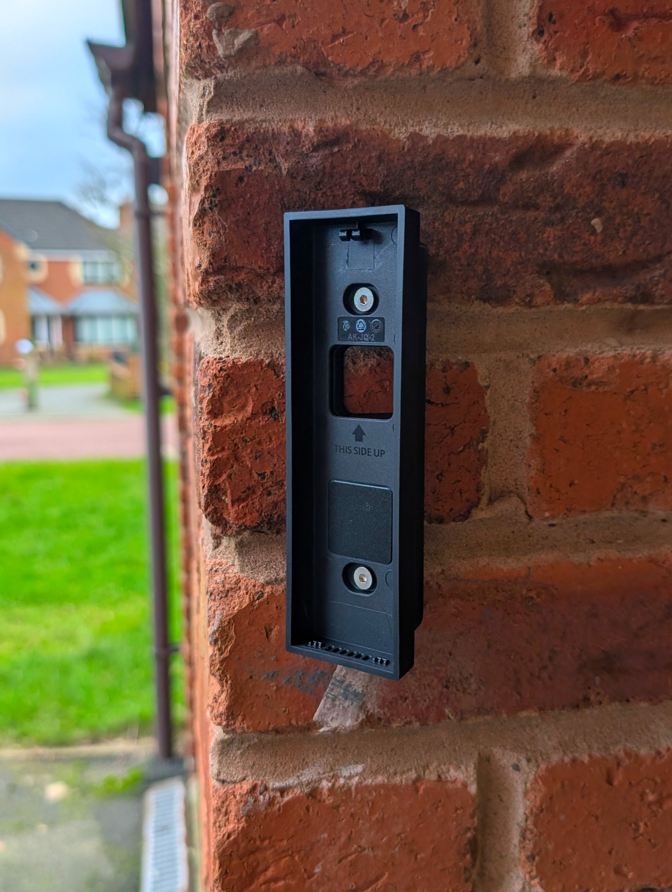 Eufy Video Doorbell E340 Reversible Angle Mount, in black. Mounted on wall.