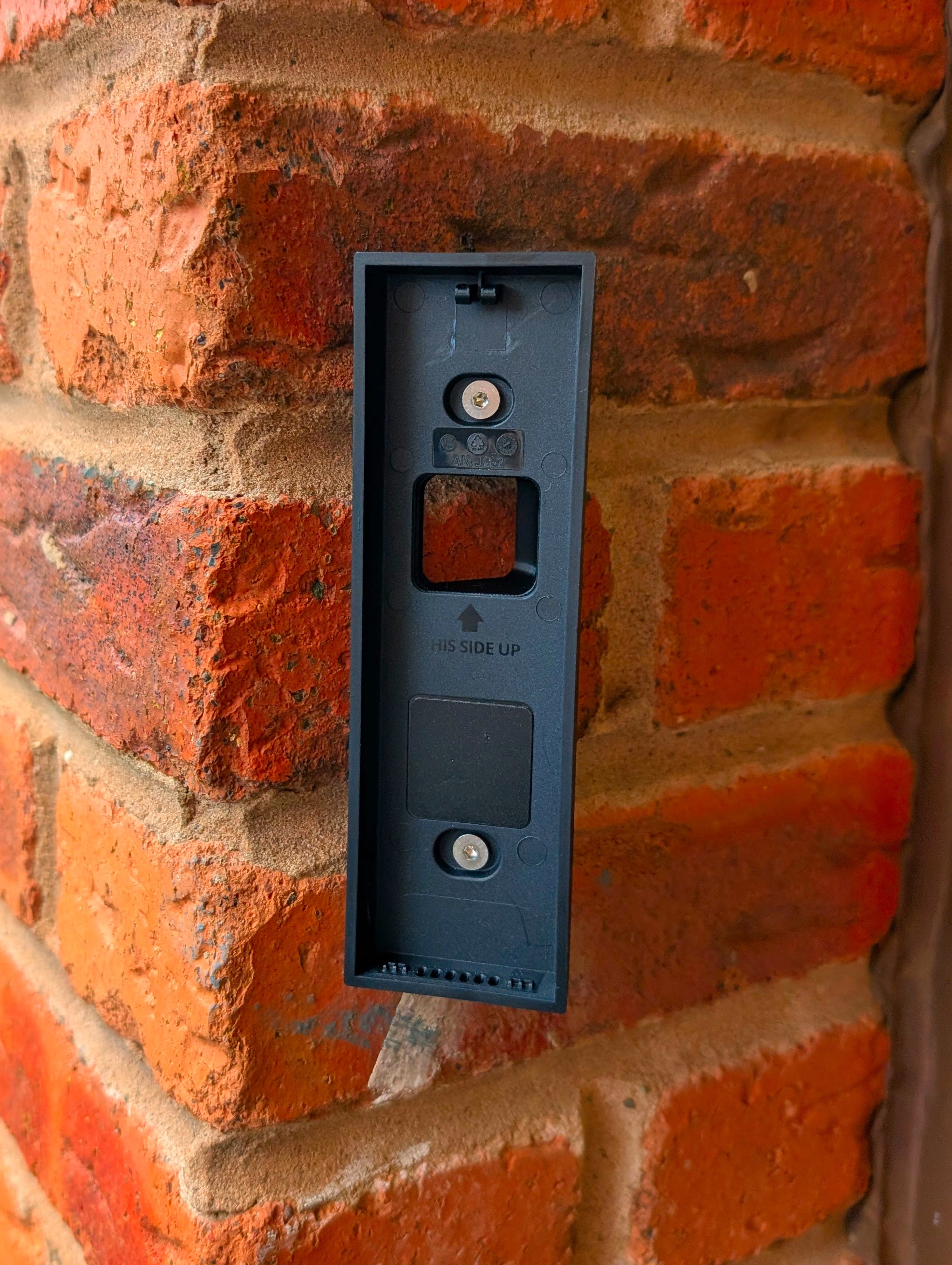 Eufy Video Doorbell E340 Reversible Angle Mount, in black. Mounted on wall.