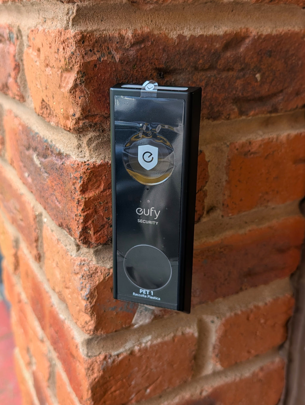 Eufy Video Doorbell E340 Reversible Angle Mount, in black. Mounted on wall.