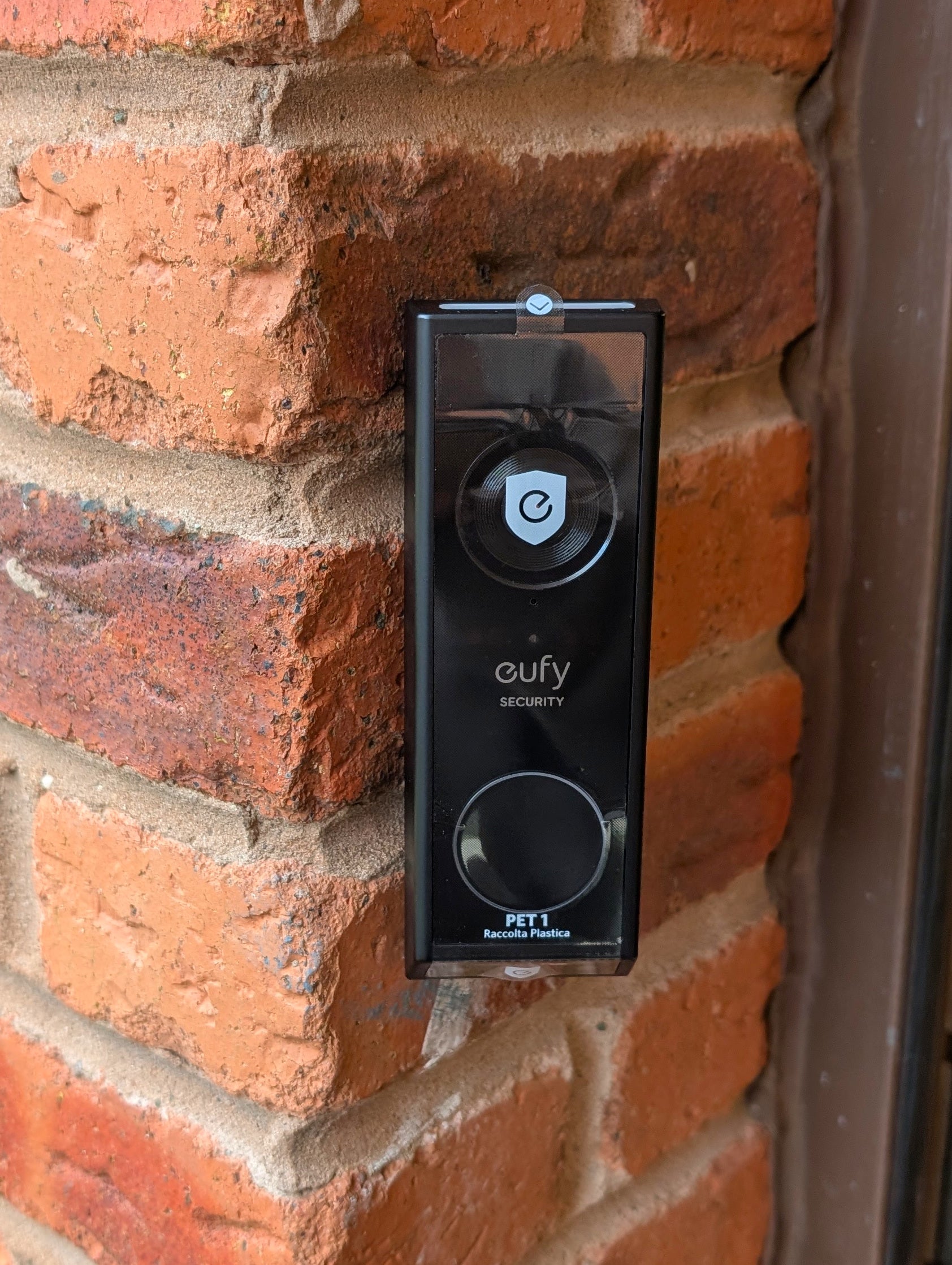 Eufy Video Doorbell E340 Reversible Angle Mount, in black. Mounted on wall.