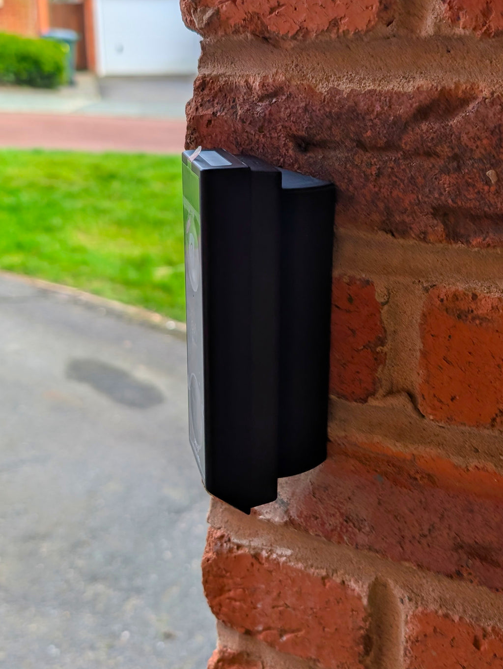 Eufy Video Doorbell E340 Reversible Angle Mount, in black. Mounted on wall.