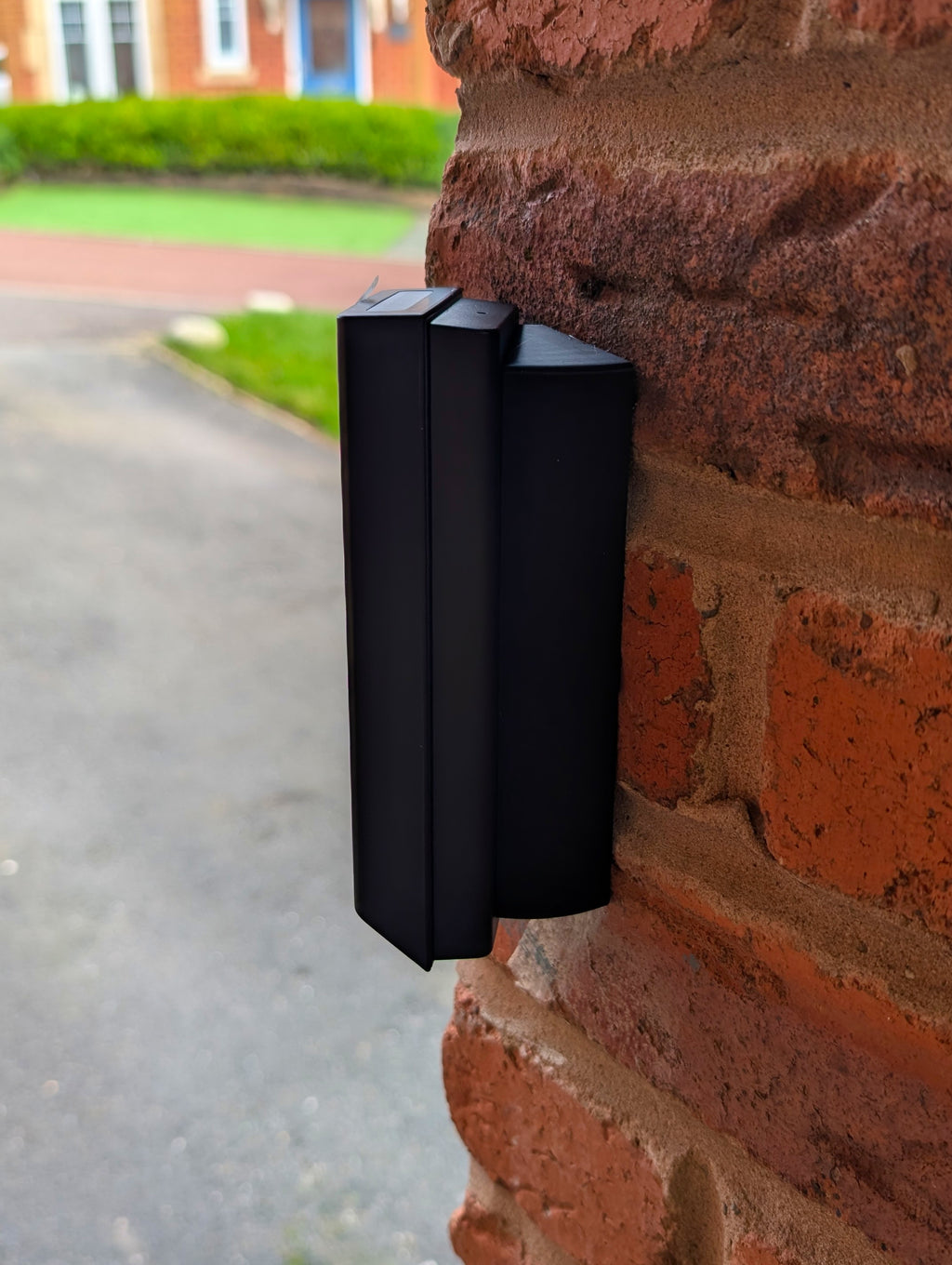 Eufy Video Doorbell E340 Reversible Angle Mount, in black. Mounted on wall.