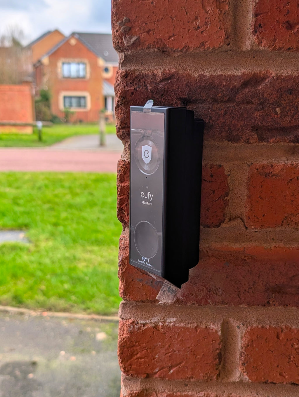 Eufy Video Doorbell E340 Reversible Angle Mount, in black. Mounted on wall.