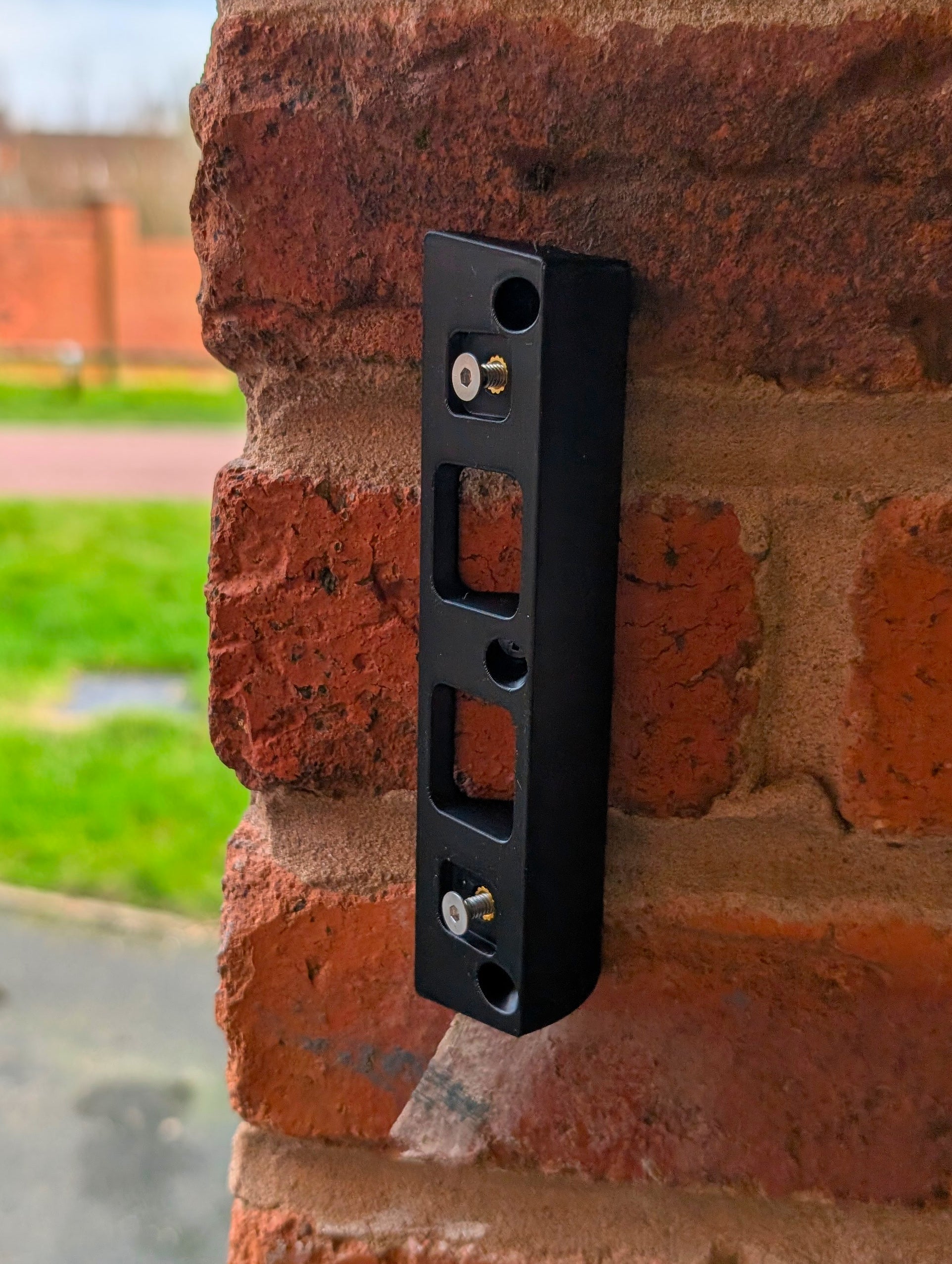 Eufy Video Doorbell E340 Reversible Angle Mount, in black. Mounted on wall.