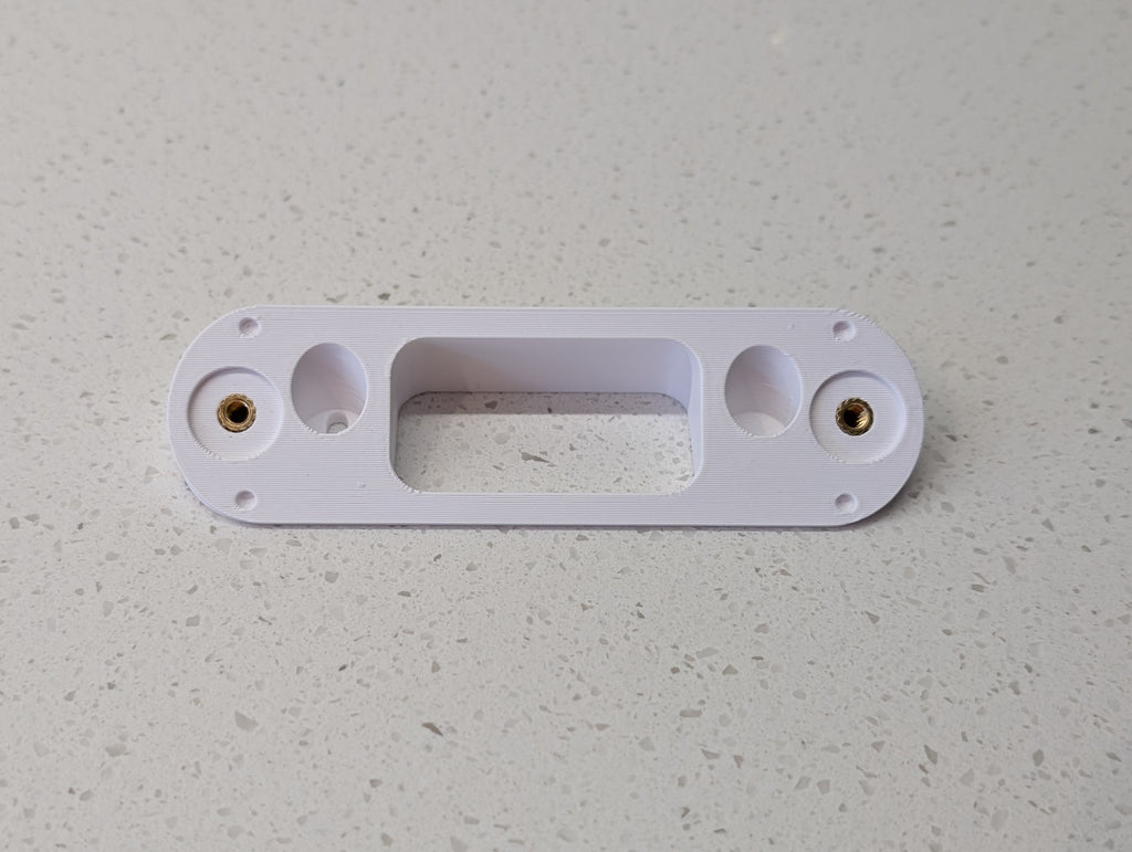 Angled wedge mount for Arlo Gen2 Doorbell, in white.