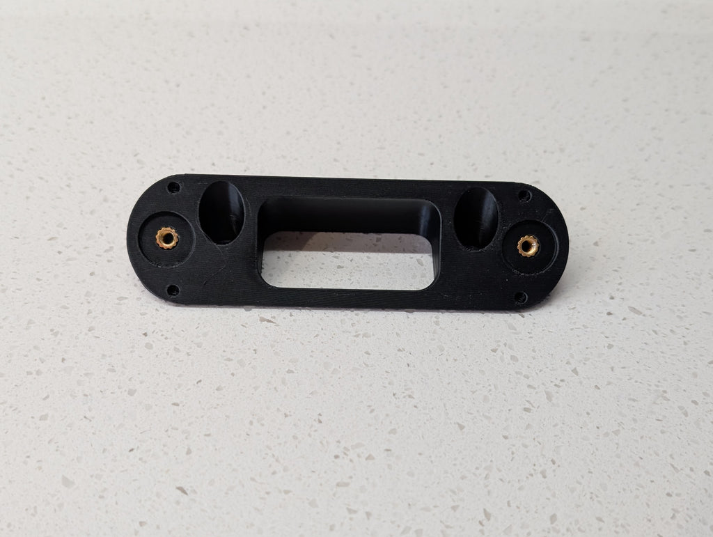 Angled wedge mount for Arlo Gen2 Doorbell, in black.