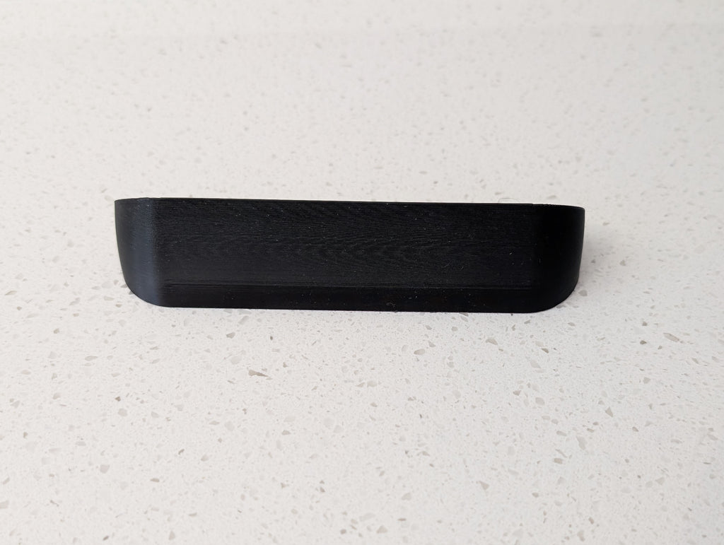 Angled wedge mount for Arlo Gen2 Doorbell, in black.